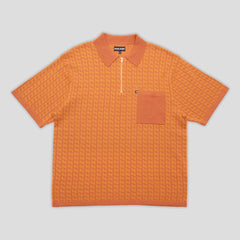 Passport drain knit s/s polo shirt Burnt orange
